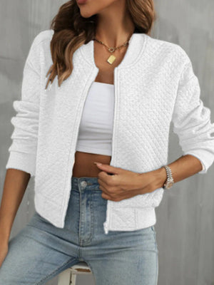White diamond quilted bomber jacket with a zip front and crew neck.