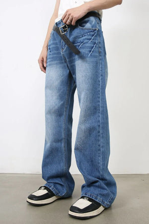 Baggy denim jeans in medium wash with distressed details and a relaxed fit.