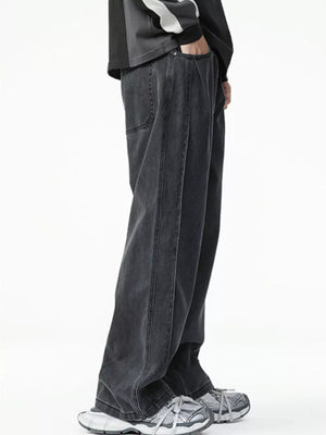 Men's dark wash cotton wide-leg jeans with a casual oversized fit.