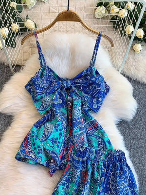 Royal blue paisley print cami with bow detail and matching wide-leg pants.