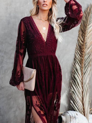 Burgundy floral lace maxi dress with V-neck, long sleeves, and a thigh slit.