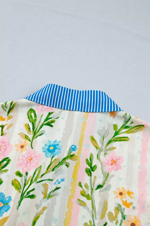 Floral print shift dress with blue striped collar and button-down detail.