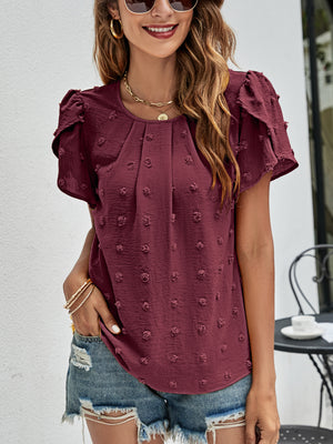 Wine textured puff sleeve blouse with dot pattern and pleated front.