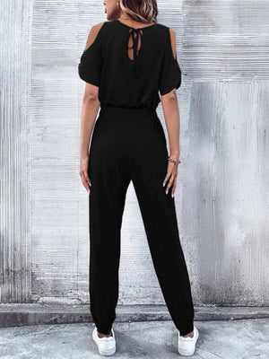 Black cold-shoulder jumpsuit with drawstring waist and tie back detail