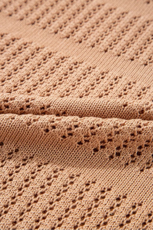 Sleek openwork knit sweater in tan with cotton blend fabric and elbow sleeves.