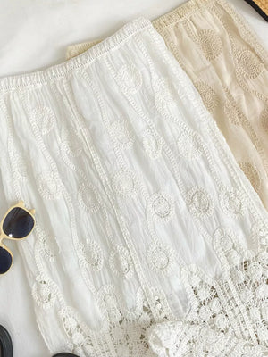 White lace midi skirt with elastic waist and crochet detail