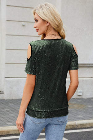 Dark green sequin cold shoulder blouse with crisscross trim detail.