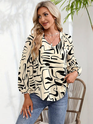Women's cream abstract scribble print blouson sleeve top