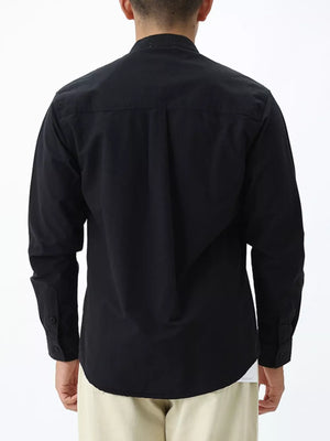 Black casual long sleeve cotton shirt with buttoned cuffs and back pleats.