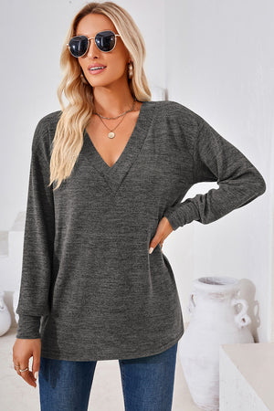 Relaxed V-neck tunic top in dark gray heather, long sleeves, casual slouch fit.