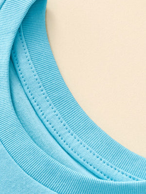 Blue cotton toddler t-shirt neckline detail with double stitching.