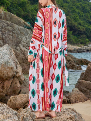 Boho print maxi beach cover-up with a tie waist and long sleeves.