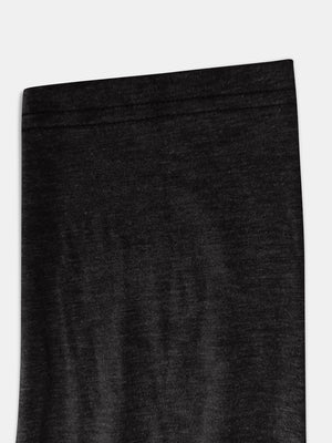 Black buttoned henley slouch tee with a textured knit fabric detail.