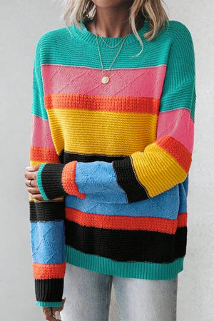 Rainbow stripe knit crewneck sweater with diamond pattern detail on sleeves.