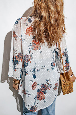 White floral dotted kimono cover-up with bell sleeves and a flowy hem.