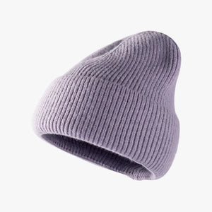 Ribbed knit slouch beanie in Lavender with a relaxed fit.