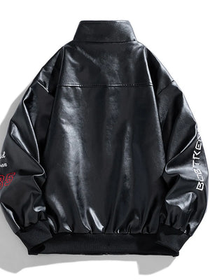 Black faux leather bomber jacket with embroidered details on sleeves and collar.