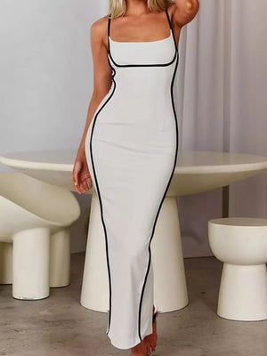 White spaghetti strap maxi dress with black contrast piping, bodycon fit.