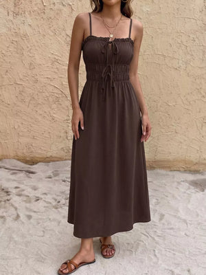 Charming tie-front midi dress in coffee brown with smocked waist and ruffle trim.