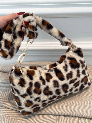 Leopard print faux fur shoulder bag with chain and white link strap detail