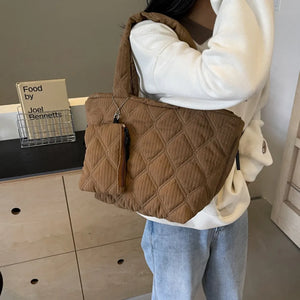 Quilted shopper bag in Coffee Brown with diamond pattern and attached coin purse.