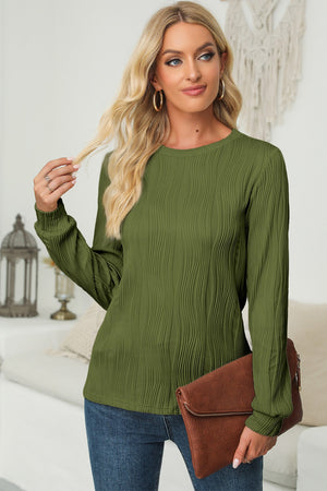 Moss green crewneck pullover with textured wave pattern and long sleeves.