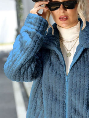 Plush ribbed zip-up jacket in Misty Blue with a collared neckline.