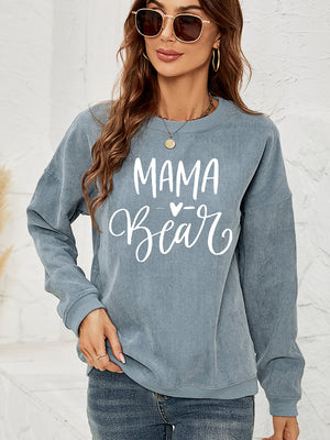 Textured corduroy sweatshirt in French Blue with white "Mama Bear" graphic and heart detail.
