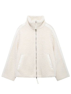 White teddy fleece zip-up jacket with contrast piping and high collar.