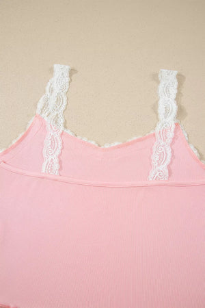 Pink ribbed cami pajama top with white lace trim straps and neckline.
