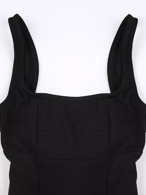 Black backless mini dress with square neckline and wide straps.