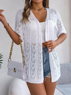 White open-knit pointelle cardigan with short sleeves and a v-neck.