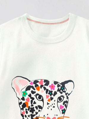 White cotton t-shirt with a colorful leopard graphic and floral accents.