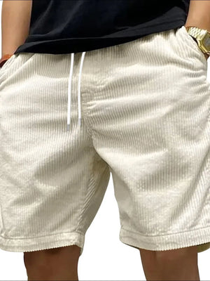 Ivory corduroy shorts with white drawstring and relaxed fit