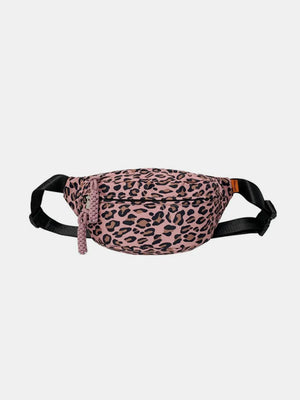 Pleated leopard print sling bag in dusty pink with a braided tassel detail.