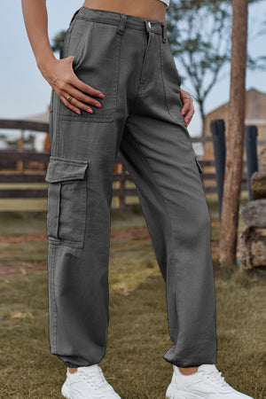 Dark gray cargo pants with multiple pockets and a relaxed fit.