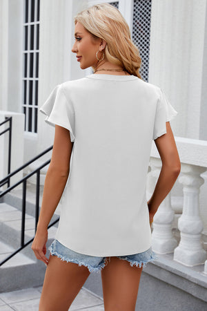 White flutter sleeve v-neck blouse with a casual, breathable fit