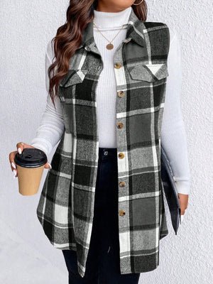 Oversized plaid shirt vest in black and white with button front and chest pockets.