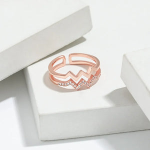 Rose gold zigzag split band ring with pave crystals