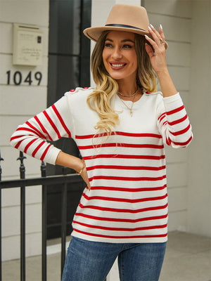 White and red striped acrylic sweater with shoulder buttons.