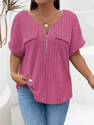 Textured ribbed knit henley in cerise with zip front and chest pockets.