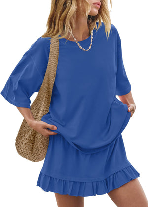 Relaxed fit sapphire blue tee and ruffled skirt set with a woven bag.