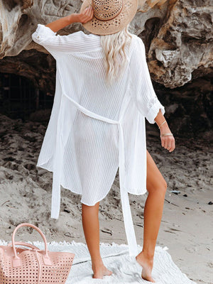 White textured beach cover-up with tie waist and buttoned cuffs