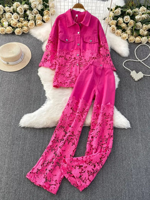 Rose red lace-embellished two-piece set with collared button-up jacket and wide-leg pants.