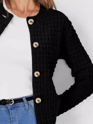 Black textured knit button-up cardigan with gold buttons.