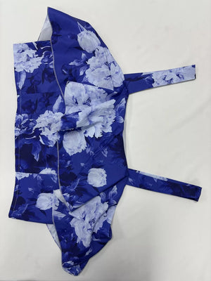 Ruffled floral two-piece set in French blue polyester with tie straps.