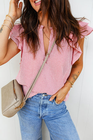 Red and white striped cotton blouse with ruffled short sleeves and a V-neck.