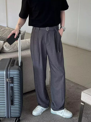 Grey belted wide-leg sweatpants with a d-ring detail.