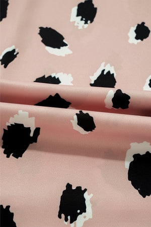 Dust Storm silk blouse with black and white spot print.