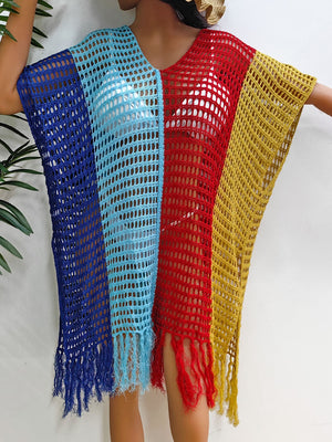 Colorblock crochet cover-up with fringe in blue, light blue, red, and yellow.